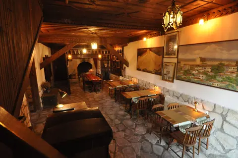 Tables arranged in a shared area with wooden details